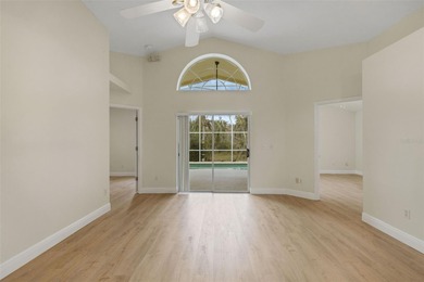 This beautiful POOL home is located in a gated, golf course on Ridgewood Lakes Golf and Country Club in Florida - for sale on GolfHomes.com, golf home, golf lot