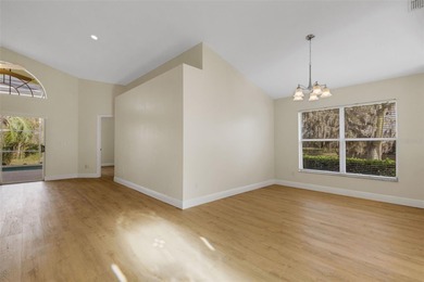 This beautiful POOL home is located in a gated, golf course on Ridgewood Lakes Golf and Country Club in Florida - for sale on GolfHomes.com, golf home, golf lot