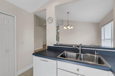 This beautiful POOL home is located in a gated, golf course on Ridgewood Lakes Golf and Country Club in Florida - for sale on GolfHomes.com, golf home, golf lot