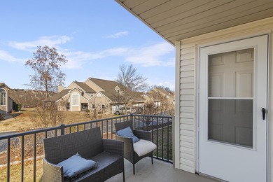 Discover refined living at its best in this pristine corner-unit on Pointe Royale Village Country Club in Missouri - for sale on GolfHomes.com, golf home, golf lot