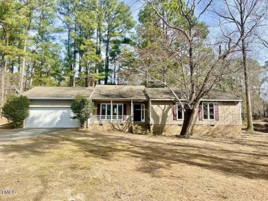 This 3 bedroom 2 bath ranch home located in a gated golf course on Carolina Lakes Country Club in North Carolina - for sale on GolfHomes.com, golf home, golf lot