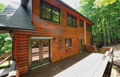 Welcome to this rare 4 bedroom, 3 1/2 bath LOG CABIN find in an on Bent Tree Golf Course in Georgia - for sale on GolfHomes.com, golf home, golf lot