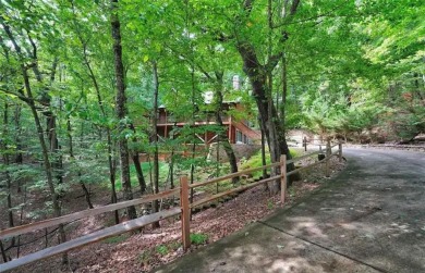 Welcome to this rare 4 bedroom, 3 1/2 bath LOG CABIN find in an on Bent Tree Golf Course in Georgia - for sale on GolfHomes.com, golf home, golf lot