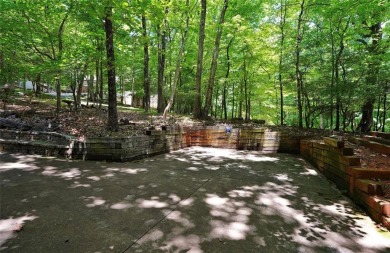 Welcome to this rare 4 bedroom, 3 1/2 bath LOG CABIN find in an on Bent Tree Golf Course in Georgia - for sale on GolfHomes.com, golf home, golf lot