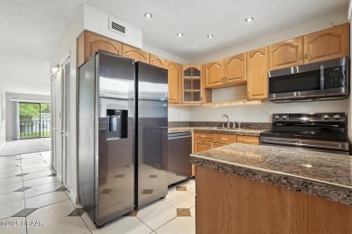 Welcome to this stylish and move-in-ready 2-bedroom, 2-bathroom on Daytona Beach Golf Club in Florida - for sale on GolfHomes.com, golf home, golf lot