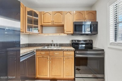 Welcome to this stylish and move-in-ready 2-bedroom, 2-bathroom on Daytona Beach Golf Club in Florida - for sale on GolfHomes.com, golf home, golf lot