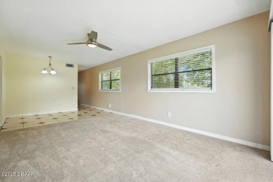 Welcome to this stylish and move-in-ready 2-bedroom, 2-bathroom on Daytona Beach Golf Club in Florida - for sale on GolfHomes.com, golf home, golf lot
