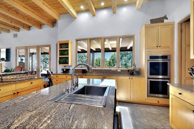 This 4 bedroom, 4 bath home, of which 1 Bedroom and 1 Bath are on The Club At Las Campanas  in New Mexico - for sale on GolfHomes.com, golf home, golf lot