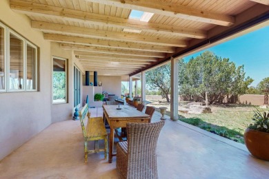 This 4 bedroom, 4 bath home, of which 1 Bedroom and 1 Bath are on The Club At Las Campanas  in New Mexico - for sale on GolfHomes.com, golf home, golf lot