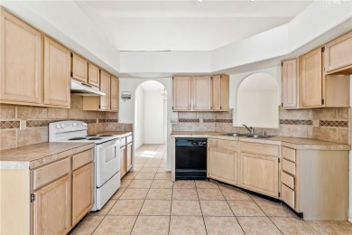 Inviting 3-Bedroom Home in Fairway Estates with Resort-Style on Desert Lakes Golf Course in Arizona - for sale on GolfHomes.com, golf home, golf lot