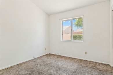 Inviting 3-Bedroom Home in Fairway Estates with Resort-Style on Desert Lakes Golf Course in Arizona - for sale on GolfHomes.com, golf home, golf lot