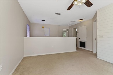 Take a look and fall in love with this three bedrooms, two and a on Harmony Golf Preserve in Florida - for sale on GolfHomes.com, golf home, golf lot