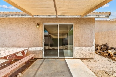 Inviting 3-Bedroom Home in Fairway Estates with Resort-Style on Desert Lakes Golf Course in Arizona - for sale on GolfHomes.com, golf home, golf lot