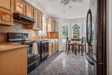 Amazing, move in ready end unit on the 6th fairway of the on Seven Springs Golf and Country Club in Florida - for sale on GolfHomes.com, golf home, golf lot