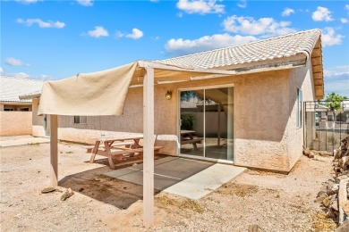 Inviting 3-Bedroom Home in Fairway Estates with Resort-Style on Desert Lakes Golf Course in Arizona - for sale on GolfHomes.com, golf home, golf lot