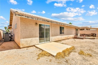 Inviting 3-Bedroom Home in Fairway Estates with Resort-Style on Desert Lakes Golf Course in Arizona - for sale on GolfHomes.com, golf home, golf lot