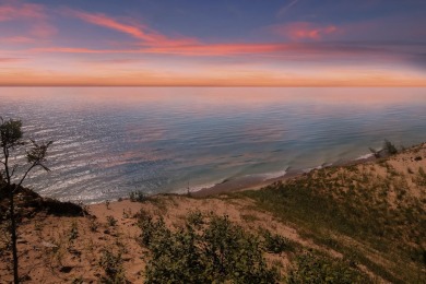 His iconic gray cottage on the bluffs of Lake Michigan and next on Arcadia Bluffs Golf Club in Michigan - for sale on GolfHomes.com, golf home, golf lot