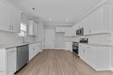 Designed with family living in mind, this home has a thoughtful on Ayden Golf and Country Club in North Carolina - for sale on GolfHomes.com, golf home, golf lot
