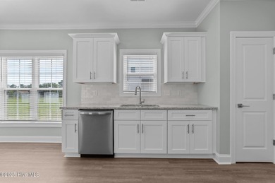 Designed with family living in mind, this home has a thoughtful on Ayden Golf and Country Club in North Carolina - for sale on GolfHomes.com, golf home, golf lot