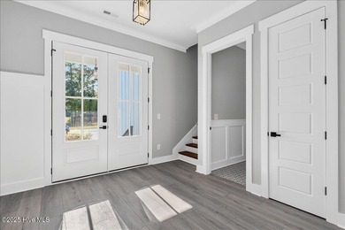 Another exquisitely crafted, custom new construction home by on Brunswick Plantation and Golf Resorts in North Carolina - for sale on GolfHomes.com, golf home, golf lot