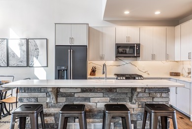 This modern four-bedroom single-family home in Granby Ranch on Headwaters Golf Course At Granby Ranch in Colorado - for sale on GolfHomes.com, golf home, golf lot