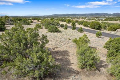 Enjoy the lovely sunsets from this elevated grassy home site, in on The Club At Las Campanas  in New Mexico - for sale on GolfHomes.com, golf home, golf lot