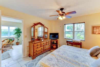 This 1ST FLOOR END UNIT condo with DEEDED COVERED PARKING WITH on Terra Ceia Golf and Country Club in Florida - for sale on GolfHomes.com, golf home, golf lot