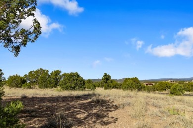 Enjoy the lovely sunsets from this elevated grassy home site, in on The Club At Las Campanas  in New Mexico - for sale on GolfHomes.com, golf home, golf lot