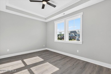 Another exquisitely crafted, custom new construction home by on Brunswick Plantation and Golf Resorts in North Carolina - for sale on GolfHomes.com, golf home, golf lot