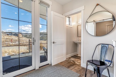 This modern four-bedroom single-family home in Granby Ranch on Headwaters Golf Course At Granby Ranch in Colorado - for sale on GolfHomes.com, golf home, golf lot