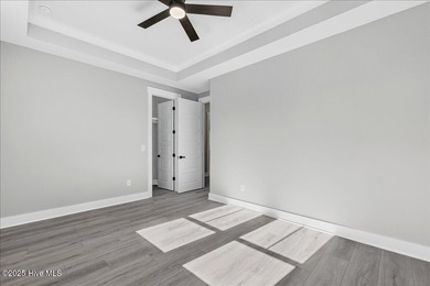 Another exquisitely crafted, custom new construction home by on Brunswick Plantation and Golf Resorts in North Carolina - for sale on GolfHomes.com, golf home, golf lot