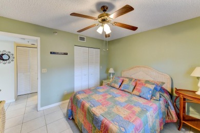 This 1ST FLOOR END UNIT condo with DEEDED COVERED PARKING WITH on Terra Ceia Golf and Country Club in Florida - for sale on GolfHomes.com, golf home, golf lot