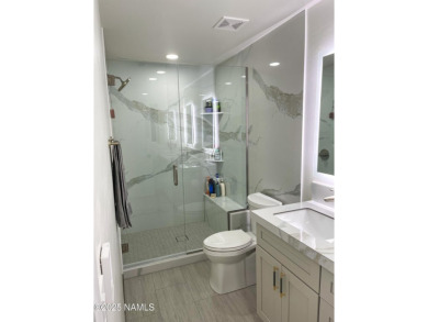 This absolutely stunning townhome located on the 17th fairway of on Aspen Valley Golf Club in Arizona - for sale on GolfHomes.com, golf home, golf lot