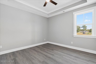 Another exquisitely crafted, custom new construction home by on Brunswick Plantation and Golf Resorts in North Carolina - for sale on GolfHomes.com, golf home, golf lot