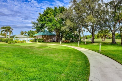 This 1ST FLOOR END UNIT condo with DEEDED COVERED PARKING WITH on Terra Ceia Golf and Country Club in Florida - for sale on GolfHomes.com, golf home, golf lot