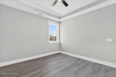 Another exquisitely crafted, custom new construction home by on Brunswick Plantation and Golf Resorts in North Carolina - for sale on GolfHomes.com, golf home, golf lot