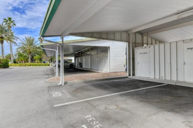 This 1ST FLOOR END UNIT condo with DEEDED COVERED PARKING WITH on Terra Ceia Golf and Country Club in Florida - for sale on GolfHomes.com, golf home, golf lot