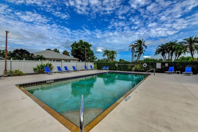 This 1ST FLOOR END UNIT condo with DEEDED COVERED PARKING WITH on Terra Ceia Golf and Country Club in Florida - for sale on GolfHomes.com, golf home, golf lot