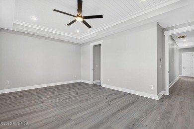 Another exquisitely crafted, custom new construction home by on Brunswick Plantation and Golf Resorts in North Carolina - for sale on GolfHomes.com, golf home, golf lot