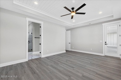 Another exquisitely crafted, custom new construction home by on Brunswick Plantation and Golf Resorts in North Carolina - for sale on GolfHomes.com, golf home, golf lot