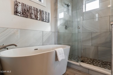 This modern four-bedroom single-family home in Granby Ranch on Headwaters Golf Course At Granby Ranch in Colorado - for sale on GolfHomes.com, golf home, golf lot