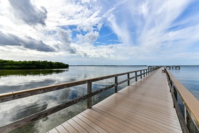 This 1ST FLOOR END UNIT condo with DEEDED COVERED PARKING WITH on Terra Ceia Golf and Country Club in Florida - for sale on GolfHomes.com, golf home, golf lot