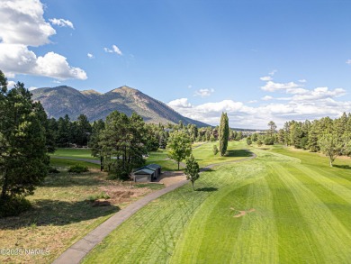This absolutely stunning townhome located on the 17th fairway of on Aspen Valley Golf Club in Arizona - for sale on GolfHomes.com, golf home, golf lot