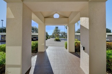 This 1ST FLOOR END UNIT condo with DEEDED COVERED PARKING WITH on Terra Ceia Golf and Country Club in Florida - for sale on GolfHomes.com, golf home, golf lot