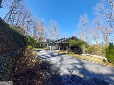 Almost brand new, beautifully updated 3-bedroom, 2-bathroom on Sky Valley Resort and Country Club in Georgia - for sale on GolfHomes.com, golf home, golf lot