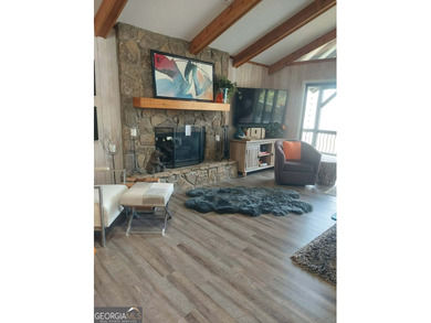 Almost brand new, beautifully updated 3-bedroom, 2-bathroom on Sky Valley Resort and Country Club in Georgia - for sale on GolfHomes.com, golf home, golf lot