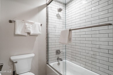 This modern four-bedroom single-family home in Granby Ranch on Headwaters Golf Course At Granby Ranch in Colorado - for sale on GolfHomes.com, golf home, golf lot