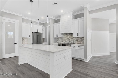 Another exquisitely crafted, custom new construction home by on Brunswick Plantation and Golf Resorts in North Carolina - for sale on GolfHomes.com, golf home, golf lot