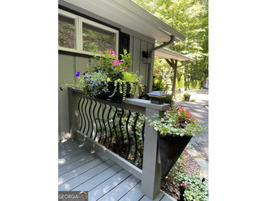 Almost brand new, beautifully updated 3-bedroom, 2-bathroom on Sky Valley Resort and Country Club in Georgia - for sale on GolfHomes.com, golf home, golf lot