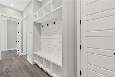 Another exquisitely crafted, custom new construction home by on Brunswick Plantation and Golf Resorts in North Carolina - for sale on GolfHomes.com, golf home, golf lot